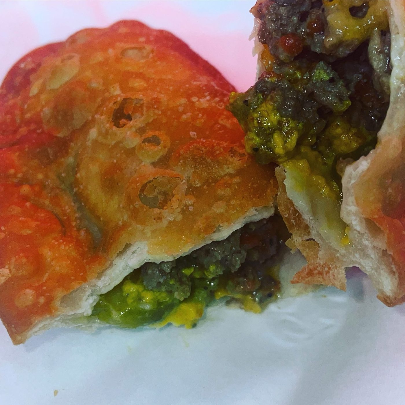 Fried empanadas with a green vegetable filling